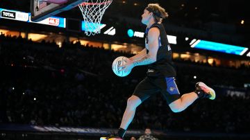 Osceola Magic's Mac McClung dunks during the slam dunk competition at the NBA basketball All-Star weekend, Saturday, Feb. 17, 2024, in Indianapolis. (AP Photo/Darron Cummings)