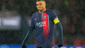 PSG's Kylian Mbappe reacts during the French League One soccer match between Paris Saint-Germain and Rennes, at the Parc des Princes stadium in Paris, France, Sunday, Feb. 25, 2024. (AP Photo/Michel Euler)