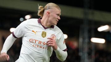 Manchester City's Erling Haaland celebrates after scoring his side's third goal during the FA Cup 5th round soccer match between Luton Town and Manchester City at the Kenilworth Road Stadium in Luton, England, Tuesday, Feb. 27, 2024. (AP Photo/Alastair Grant)