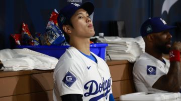 Seoul (Korea, Republic Of), 21/03/2024.- Japanese player Shohei Ohtani of the Los Angeles Dodgers prepares in dugout prior to the start of the 2024 MLB Seoul Series game between the Los Angeles Dodgers and the San Diego Padres at Gocheok Sky Dome in Seoul, South Korea, 21 March 2024. According to reports on Major League Baseball website, Los Angeles Dodgers designated hitter Shohei Ohtani's translator and close friend, Ippei Mizuhara, has been fired by the LA Dodgers following accusations from Ohtani's lawyers. Ohtani's legal team has claimed that Mizuhara allegedly used Ohtani's funds for betting activities with an illegal bookmaker, who is currently under federal investigation. (Japón, Corea del Sur, Seúl) EFE/EPA/JEON HEON-KYUN