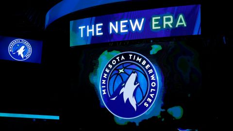 FILE - In this April 11, 2017, file photo, the new Minnesota Timberwolves logo is unveiled on the scoreboard during halftime of the team's NBA basketball game against the Oklahoma City Thunder, in Minneapolis. The Timberwolves are getting into the jersey advertisement game with a Fitbit patch in a three-year deal. The Timberwolves announced the marketing collaboration for the team's first jersey patch on Tuesday, June 20, 2017. (AP Photo/Jim Mone, File)