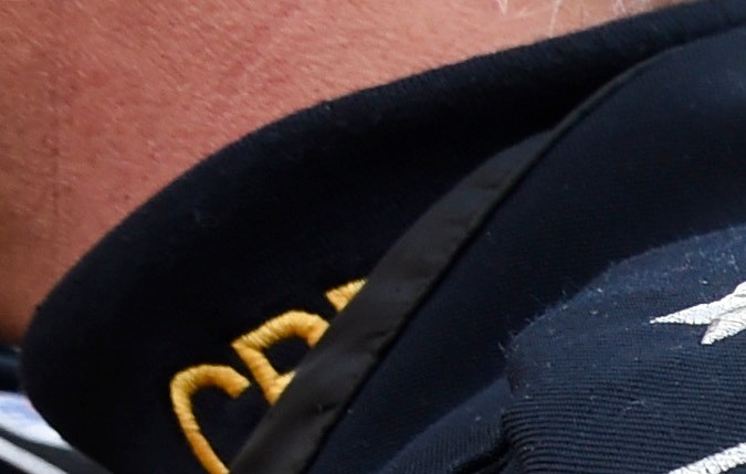 FILE - In this Dec. 10, 2015, file photo, pedestrians crossing from Mexico into the United States at the Otay Mesa Port of Entry wait in line in San Diego. U.S. Customs and Border Protection officers will be key players in putting President Donald Trump's revised travel ban into effect on Thursday, June 29, affecting visitors from six mostly Muslim countries. The busiest point of entry is San Diego's San Ysidro crossing with Tijuana, Mexico, with 31.8 million admissions during the latest 12-month period, an average of 87,000 a day. (AP Photo/Denis Poroy, File)