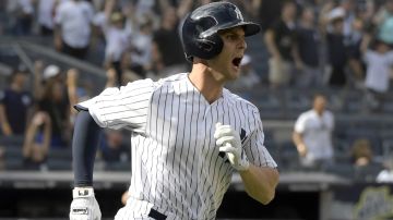 New York Yankees pinch-hitter Greg Bird reacts as he flies out to deep right field with the bases loaded to end the eighth inning of a baseball game against the Detroit Tigers Sunday, Sept. 2, 2018, at Yankee Stadium in New York. The Tigers won 11-7. (AP Photo/Bill Kostroun)