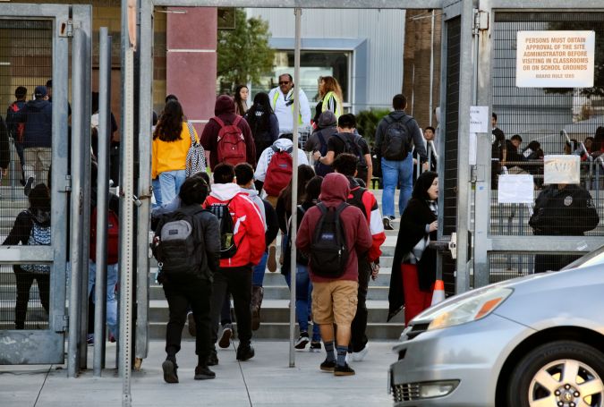 Students arrive at the Miguel Contreras Learning Complex high school returning on the first day back after a city wide teacher strike in downtown Los Angeles on Wed. Jan. 23, 2019,Thousands of Los Angeles teachers returned to work Wednesday after voting to ratify a deal between their union and school officials, ending a six-day strike in the nation's second-largest district.(AP Photo/Richard Vogel)