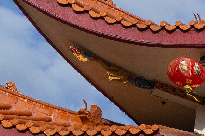 A person walks past the closed Thien Hau Temple in the Chinatown neighborhood of Los Angeles on Thursday, April 2, 2020, during the coronavirus outbreak. (AP Photo/Damian Dovarganes)