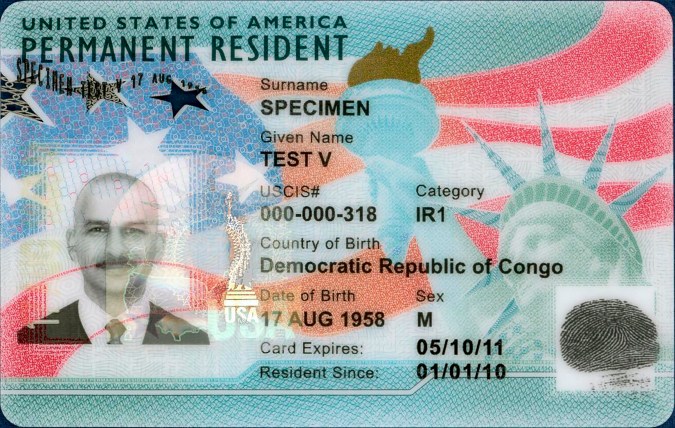 This undated image from the U.S. Citizenship and Immigration Service shows the front of a sample "green card," formally known as a Permanent Resident Card. President Donald Trump has hinted that he might extend a 60-day hold on green cards for foreign workers that he ordered to protect American jobs during the coronavirus outbreak. Analysts predict the number of green cards issued annually will drop from about 1 million to 300,000 if the changes stand. (USCIS via AP)