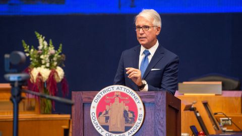 In this photo provided by the County of Los Angeles, incoming Los Angeles County District Attorney George Gascon speaks after he was sworn in during a mostly-virtual ceremony in downtown Los Angeles Monday, Dec. 7, 2020. Gascon, who co-authored a 2014 ballot measure to reduce some nonviolent felonies to misdemeanors, has promised more reforms to keep low-level offenders, drug users and those who are mentally ill out of jail and has said he won't seek the death penalty. (Bryan Chan/County of Los Angeles via AP)