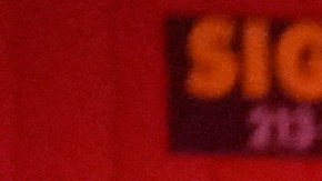 Los Angeles Fire Department paramedics move an injured person into an ambulance after a car crashed against a parked pizza oven trailer on Sunset Boulevard in Los Angeles on Saturday, Dec. 26, 2020. Two people in were transported to a hospital, according to firefighters. (AP Photo/Damian Dovarganes)