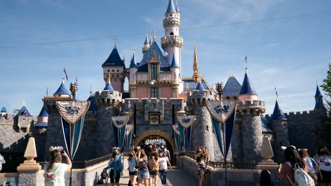 The Sleeping Beauty Castle is seen at Disneyland in Anaheim, Calif., Friday, April 30, 2021. The iconic theme park in Southern California that was closed under the state's strict virus rules swung open its gates Friday and some visitors came in cheering and screaming with happiness. (AP Photo/Jae C. Hong)