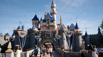 The Sleeping Beauty Castle is seen at Disneyland in Anaheim, Calif., Friday, April 30, 2021. The iconic theme park in Southern California that was closed under the state's strict virus rules swung open its gates Friday and some visitors came in cheering and screaming with happiness. (AP Photo/Jae C. Hong)