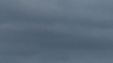 This aerial photo shows a reopened beach in Huntington Beach, Calif., Monday, Oct. 11, 2021. Huntington Beach reopened its shoreline this morning after water testing results came back with non-detectable amounts of oil associated toxins in ocean water, city officials and California State Parks announced. (AP Photo/Ringo H.W. Chiu)