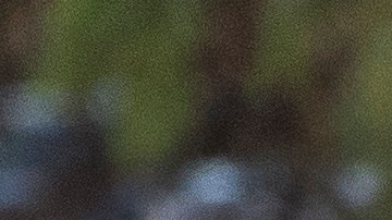 A Orange County Sheriff deputy removes yellow tape from a vehicle outside the Geneva Presbyterian Church in Laguna Woods, Calif., Sunday, May 15, 2022, after a fatal shooting. (AP Photo/Damian Dovarganes)