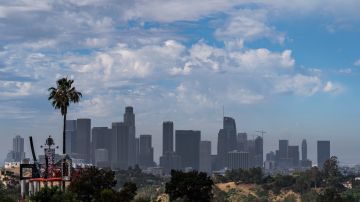 Cloud formations move over downtown Los Angeles, Wednesday, June 22, 2022. (AP Photo/Damian Dovarganes)