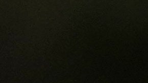 Una manifestante protesta contra un plan para vender píldoras abortivas en farmacias de Walgreens.