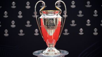 The trophy is on display before the 2023/24 UEFA Champions League group stage draw at the Grimaldi Forum in Monaco, Thursday, Aug. 31, 2023. (AP Photo/Daniel Cole)