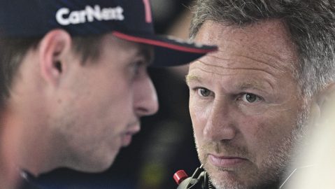 Red Bull team principal Christian Horner, right, talks to Red Bull driver Max Verstappen of the Netherlands before the qualifying session ahead of Sunday's Formula One Italian Grand Prix auto race, at the Monza racetrack, in Monza, Italy, Saturday, Sept. 2, 2023. (Christian Bruna/Pool via AP)