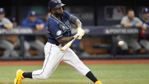 Tampa Bay Rays' Randy Arozarena bats against the Texas Rangers in Game 2 in an AL wild-card baseball playoff series, Wednesday, Oct. 4, 2023, in St. Petersburg, Fla. (AP Photo/John Raoux)