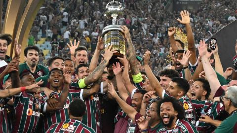 Players of Brazil's Fluminense celebrate with the trophy after winning the Copa Libertadores final soccer match against Argentina's Boca Juniors at Maracana stadium in Rio de Janeiro, Brazil, Saturday, Nov. 4, 2023. (AP Photo/Alexandre Brum)