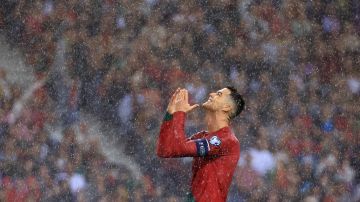 Portugal's Cristiano Ronaldo reacts during the Euro 2024 group J qualifying soccer match between Portugal and Slovakia at the Dragao stadium in Porto, Portugal, Friday, Oct. 13, 2023. (AP Photo/Luis Vieira)
