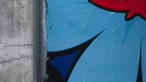 A woman walk under the rain in Los Angeles, Monday, Feb. 19, 2024. (AP Photo/Damian Dovarganes)