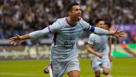 FILE - Cristiano Ronaldo celebrates after scoring his side's second goal playing for a combined XI of Saudi Arabian teams Al Nassr and PSG during a friendly soccer match, at the King Saud University Stadium, in Riyadh, Saudi Arabia, Thursday, Jan. 19, 2023. Cristiano Ronaldo has come under heavy criticism after seemingly making an offensive gesture following Al Nassr’s 3-2 victory over Al Shabab in a Saudi Pro League match on Sunday, Feb. 25, 2024. (AP Photo/Hussein Malla, File)