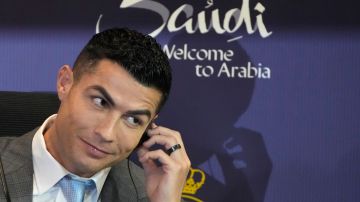 FILE - Cristiano Ronaldo speaks during a press conference for his official unveiling as a new member of Al Nassr soccer club in in Riyadh, Saudi Arabia, Tuesday, Jan. 3, 2023. Cristiano Ronaldo has come under heavy criticism after seemingly making an offensive gesture following Al Nassr’s 3-2 victory over Al Shabab in a Saudi Pro League match on Sunday, Feb. 25, 2024. (AP Photo/Amr Nabil, File)