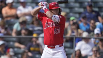 Los Angeles Angels' Mike Trout hits against the Milwaukee Brewers during the first inning of a spring training baseball game, Tuesday, Feb. 27, 2024, in Tempe, Ariz. (AP Photo/Matt York)