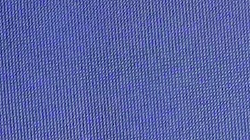 Third place, Ferrari driver Carlos Sainz of Spain holds up his trophy on the podium during the Formula One Bahrain Grand Prix at the Bahrain International Circuit in Sakhir, Bahrain, Saturday, March 2, 2024. (AP Photo/Darko Bandic)