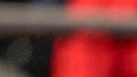 Los Angeles Angels' Miguel Sanó scores on a double from Logan O'Hoppe as Texas Rangers catcher Jonah Heim, right, stands away from the plate during the first inning of a spring training baseball game Monday, March 4, 2024, in Surprise, Ariz. (AP Photo/Lindsey Wasson)