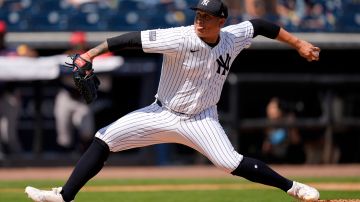 New York Yankees relief pitcher Victor Gonzalez throws in the fourth inning of a spring training baseball game against the Atlanta Braves Sunday, March 10, 2024, in Tampa, Fla. (AP Photo/Charlie Neibergall)