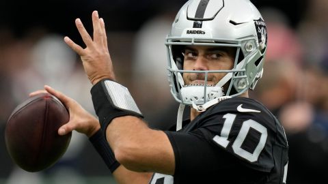 FILE - Las Vegas Raiders quarterback Jimmy Garoppolo (10) warms up before an NFL football game against the New England Patriots, Sunday, Oct. 15, 2023, in Las Vegas. Garoppolo, was by the Raiders earlier this week, has signed with the Los Angeles Rams as the backup to Matthew Stafford, the Rams announced Friday, March 15, 2024. (AP Photo/John Locher, File)