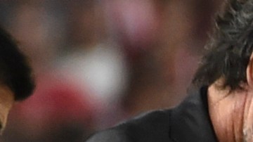 Estudiantes de La Plata's Javier Altamirano is assisted by members of his team during an Argentine soccer league match against Boca Juniors in La Plata, Argentina, Sunday, March 17, 2024. The match was suspended after Altamirano was taken off the field in ambulance.(AP Photo/Ignacio Amiconi )