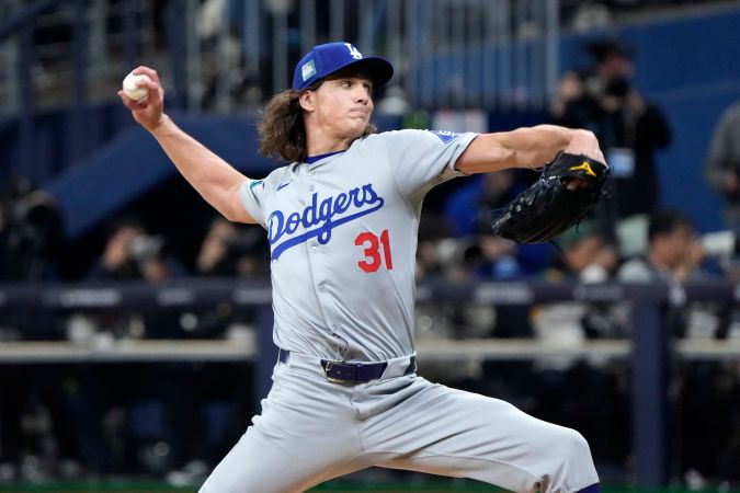 Los Angeles Dodgers starting pitcher Tyler Glasnow throws to the plate during the first inning of an opening day baseball game against the San Diego Padres at the Gocheok Sky Dome in Seoul, South Korea Wednesday, March 20, 2024, in Seoul, South Korea. (AP Photo/Ahn Young-joon)