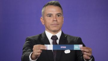 Former Argentinian soccer player Javier Saviola draws Spain during the draw for the Paris 2024 Olympic Soccer tournaments, Wednesday, March 20, 2024 in Saint-Denis, outside Paris. (AP Photo/Christophe Ena)