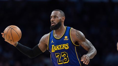 Los Angeles Lakers forward LeBron James dribbles during the first half of an NBA basketball game against the Philadelphia 76ers Friday, March 22, 2024, in Los Angeles. (AP Photo/Jae C. Hong)