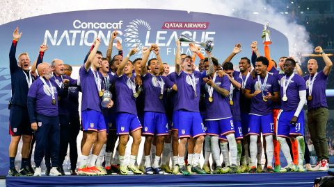 United States players celebrate on the podium after a win over Mexico in a CONCACAF Nations League final soccer match, Sunday, March 24, 2024, in Arlington, Texas. (AP Photo/Julio Cortez)