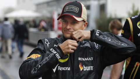 Lotus driver Heikki Kovalainen of Finland arrives for the first practice session for the Formula One U.S. Grand Prix auto race at the Circuit of the Americas, Friday, Nov. 15, 2013, in Austin, Texas. Kovalainen will replace Kimi Raikkonen after Raikkonen pulled out of this weekend's United States Grand Prix and the finale in Brazil to undergo back surgery to cure a long-standing problem. (AP Photo/Darron Cummings)