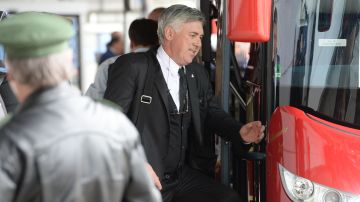 Real Madrid head coach Carlos Ancelotti arrives at the airport in Munich, Germany, oMonday, April 28, 2014. Bayern Munich will face Real Madrid in a second leg semifinal Champions League soccer match on Tuesday. (AP Photo/Kerstin Joensson)