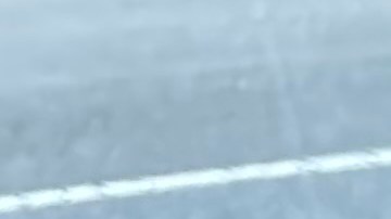 Isaías Dr. Rodriguez muestra una de sus pequeñas piñatas, un elote.