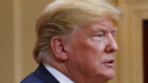 Vladimir Putin, presidente de Rusia, y Donald Trump, entonces presidente estadounidense