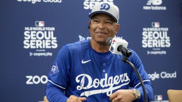 Los Angeles Dodgers manager Dave Roberts attends a news conference ahead of a baseball workout at the Gocheok Sky Dome in Seoul, South Korea, Saturday, March 16, 2024. (AP Photo/Lee Jin-man)