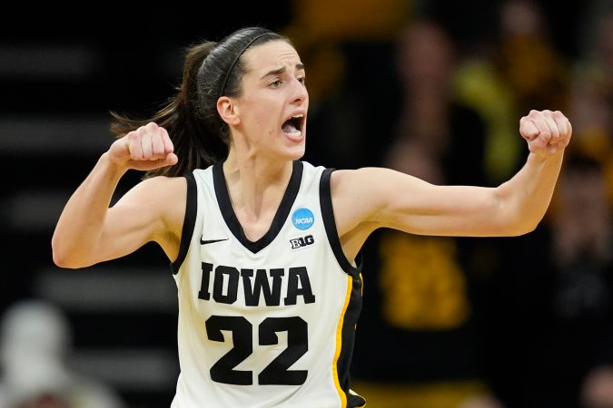 FILE - Iowa guard Caitlin Clark reacts during a second-round college basketball game against West Virginia in the NCAA Tournament, Monday, March 25, 2024, in Iowa City, Iowa. As Clark has become the face of women's basketball, her face is everywhere. She has lucrative NIL deals with Nike, Gatorade, Buick and was featured in a State Farm commercial with Jimmy Butler and Reggie Miller. (AP Photo/Charlie Neibergall, File)
