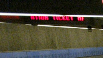 Los Angeles County Sheriff's Deputy Baron Howard, lower left, descends to the platform on the Los Angeles Metro subway's Hollywood and Vine Station during regular patrol Friday, March 12, 2004. Authorities around California said Friday they were being vigilant in guarding transportation systems after the bombings in Spain, and some commuters were on edge. The sheriff's department has been running drills to prepare for attacks on rail and bus lines. (AP Photo/Nick Ut)