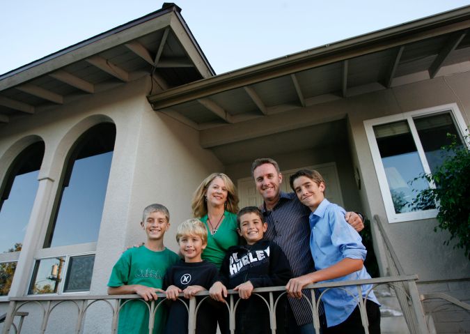 Robert and Celeste Blodgett, background, pose with their four sons, from left to right, Garrett, 12, Mark, 7, Matthew, 9, and Zachary, 14, at their home in El Cajon, Calif., Thursday, Nov. 5, 2008. Robert Blodgett feels that Nebraska's safe haven law is appalling and says abandoning teens is simply not an option. (AP Photo/Denis Poroy)