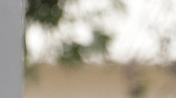 Los Angeles County Sheriff's homicide detectives help police investigate an officer-involved shooting that happened at the end of a car pursuit in Glendale, Calif., on Monday, March 14, 2016. The driver hit speeds topping 100 mph during the pursuit that was broadcast live on news stations Sunday night. Police shot and killed a suspect who stole a West Covina patrol car, partially seen left, and led officers on an hour-long chase across Southern California freeways that ended when an officer in an SUV slammed into the stolen vehicle in the alley, pinning the suspect inside as he gunned the engine, trying to escape again. Police opened fire, killing the 45-year-old man at the scene, authorities said. (AP Photo/Nick Ut)