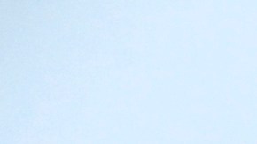 A pedestrian walks along a soggy city street in downtown Los Angeles on Monday, Oct. 17, 2016. Motorists are warned of slick roads as a weak cold front brings rain to parts of Southern California. (AP Photo/Nick Ut)