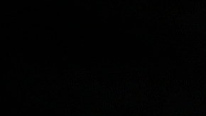 A friend of Carl Angelo Arnaiz, a teenager who was killed in an alleged shootout with police, waits to place a flower on his tomb during a burial ceremony in Manila, Philippines, Tuesday, Sept. 5, 2017. A government forensic team says Carl Angelo Arnaiz, who apparently was handcuffed, was tortured before he was shot five times following an attempted robbery. His death occurred during a renewed police crackdown against drugs and crimes that killed more than 80 suspects in just three days, in the bloodiest few days under Philippine President Rodrigo Duterte's war on drugs. (AP Photo/Aaron Favila)