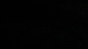 A friend of Carl Angelo Arnaiz, a teenager who was killed in an alleged shootout with police, waits to place a flower on his tomb during a burial ceremony in Manila, Philippines, Tuesday, Sept. 5, 2017. A government forensic team says Carl Angelo Arnaiz, who apparently was handcuffed, was tortured before he was shot five times following an attempted robbery. His death occurred during a renewed police crackdown against drugs and crimes that killed more than 80 suspects in just three days, in the bloodiest few days under Philippine President Rodrigo Duterte's war on drugs. (AP Photo/Aaron Favila)