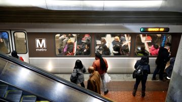 A Metro train arrives at the Gallery Place-Chinatown Metro Station, Thursday, Jan. 11, 2018, in Washington. Washington's Metro system has become internationally synonymous with delays, breakdowns and smoke-filled tunnels. (AP Photo/Alex Brandon)