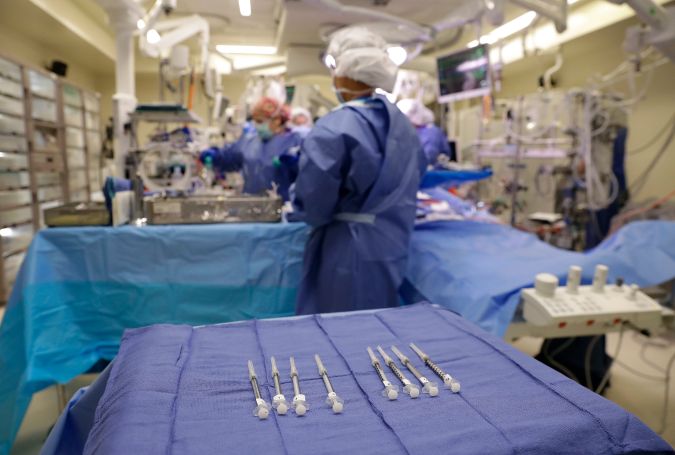 In this Nov. 28, 2016 photo, syringes sit on a table during an open heart surgery at the University of Maryland Medical Center in Baltimore. (AP Photo/Patrick Semansky)